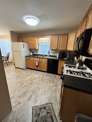 Looking into the kitchen from the hallway entrance