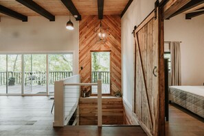 as you walk into the house, you are greeted with a stylish modern cabin feel.