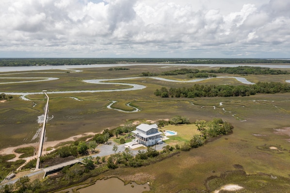 Marsh Madness - a SkyRun Kiawah Property - Aerial view of home and dock