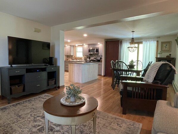 Living room into dining area and kitchen