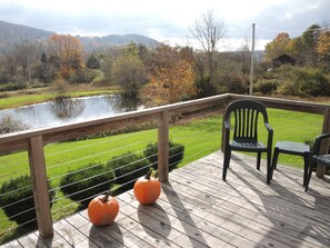 Front deck overlooking pond and hills