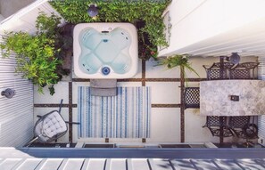 outdoor 20 jet jacuzzi, outdoor garden seating, bamboo trees, swing egg chair. 