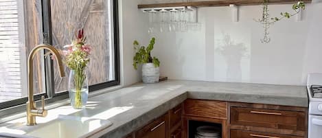 Concrete counter top and oak cabinet