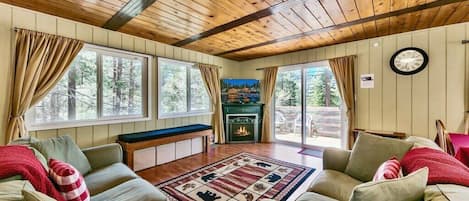 The cozy living room is an ideal space for relaxing after a long day of exploring South Tahoe. This room is equipped with a gas fireplace, comfy couches, and a large flat screen TV.