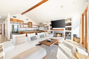 Take in the view of the ocean in the living space drenched in natural sunlight. 