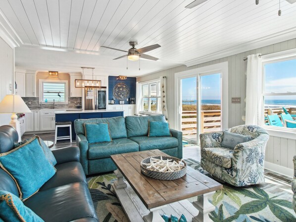 Stretch out on the comfortable furniture in the Living Area for family movie night in front of the Flat Screen TV as you enjoy the ocean views.