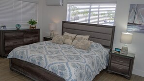 Master bedroom with all the extras and a super comfy king bed to sleep easy. 