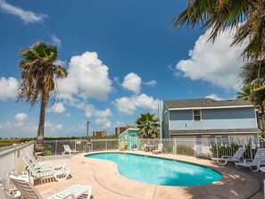 Enjoy your day lazing in the sun by our sparkling pool with conveniently placed lounge chairs!