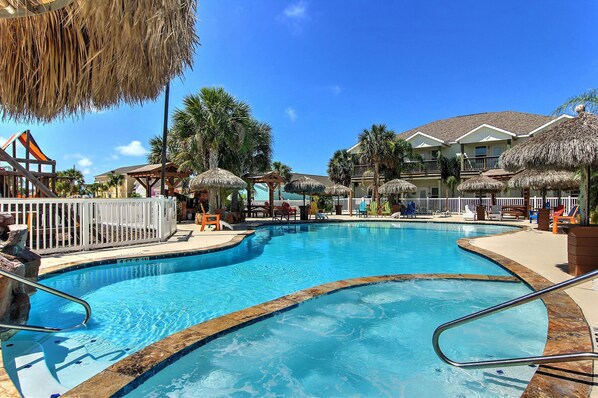 Don't forget your sunscreen! This community pool is begging to be swam in.