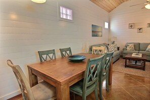 This dining table seats 6 and is a great spot to share a meal or have game night and make memories.
