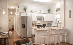 Good Mornings - After a great night's sleep, you're only steps away from pulling up a stool to the breakfast bar and enjoy a morning cup of joe with your friends.