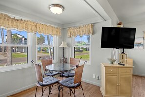 Cozy Dining - Seating for four at your dining room table provides a cozy atmosphere for a home cooked family dinner, right outside your kitchen area.