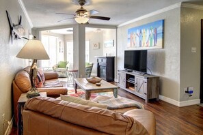 The living room provides quick and easy access to the patio where you can sit and enjoy your surroundings.