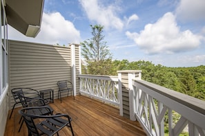 Enjoy morning coffee or evening cocktails on the deck overlooking the valley.