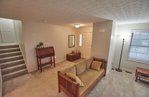 Living room , stairs to the second floor 