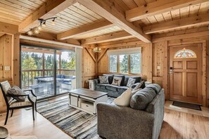 Family room A, pull out sofa bed (full) and outdoor patio.  Wood burning fireplace.