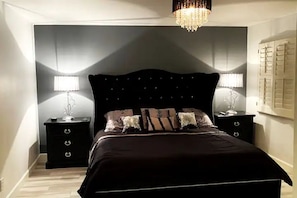 Primary features a king bed, huge walkin closet, additional mirrored closet, TV