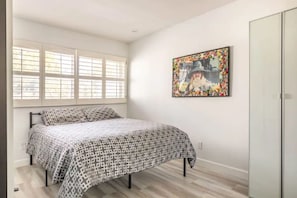 Guest features a Queen Bed, Big closet, storage and smart TV