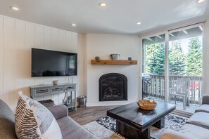 Living Room- Couch, Gas Fireplace Flat Screen TV