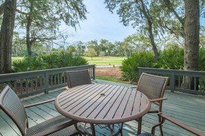 Siesta by the Sea features a large back deck with views of the Robert Trent Jones golf course.