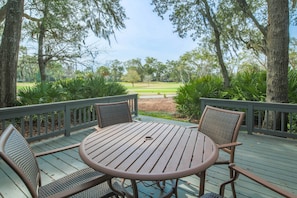 Siesta by the Sea features a large back deck with views of the Robert Trent Jones golf course.