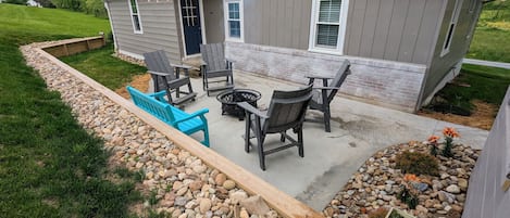 New for 2023! Backyard patio and fire pit.