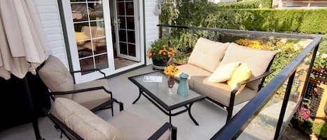 upper patio.  French doors lead into the dinning room/kitchen.