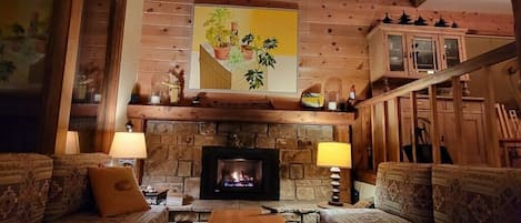 Warm and inviting fireplace area - enjoy games, puzzles and hanging out here