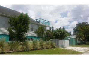 side yard with view of deck