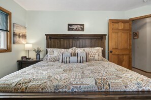 A king bedroom upstairs next to the bathroom. There is a TV here with Spectrum TV. Our guests RAVE about our plush mattresses and comforters!