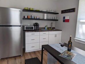 Kitchenette has fridge, freezer, toaster oven/air fryer, Keurig (with pods)...