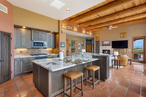 Spacious kitchen with marble counters and plenty of storage