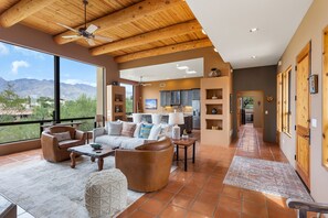 Family Room with exposed wood ceiling.