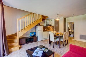Sink into the cozy sofa after a day exploring the area.