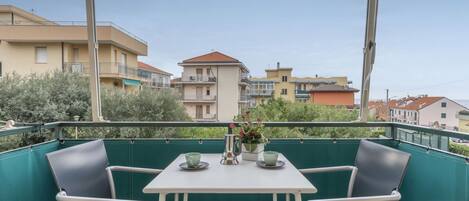 Sky, Table, Property, Building, Cloud, Window, Azure, Plant, Chair, Outdoor Furniture