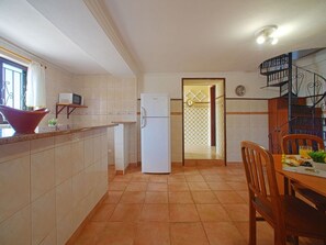 Wood, Lighting, Kitchen, Window, Interior Design, Cabinetry, Flooring, Floor, Wood Stain, Door