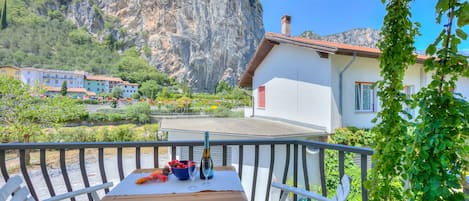 The balcony overlooking the Sarca River and mountains