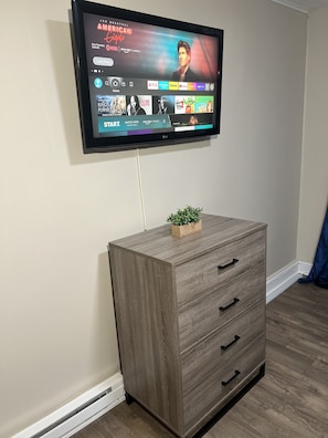 Dresser in bedroom + 43in TV with Fire TV