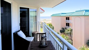 Balcony with ocean view and seating for watching the waves roll in