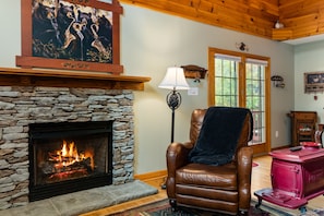 Gas fireplace in the family room to keep warm during the Winter.