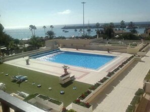 Imagine! A swimming pool in the front of the complex. Perfect for keeping cool!