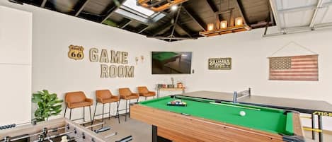 Make yourself at home in our cozy game room, complete with a billiards table for a relaxing stay.