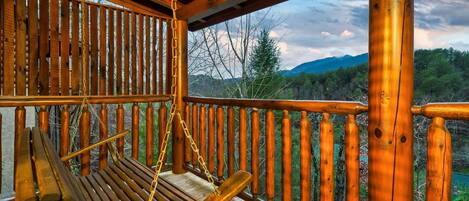 Enjoy views of Bluff Mountain from the porch swing on the back deck.