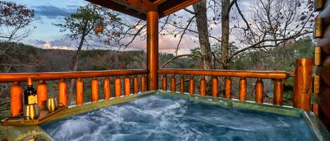 Enjoy views of Bluff Mountain from the 4 person hot tub