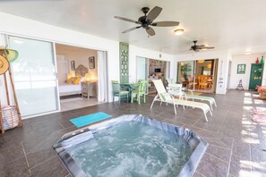 Exterior. Hot tub facing the master bedroom and overlooking the lake.