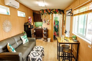 Welcome to your tropical tiny home away from home in the hills.