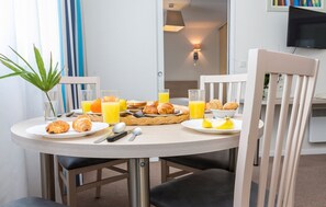 Share meals and laughs at the dining table.