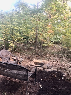 Outside firepit at Maybelle. One bundle of firewood included with your stay.
