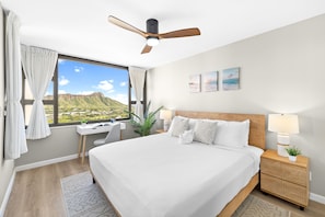 Relax in your bedroom with a beautiful mountain view.