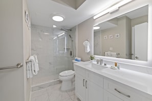 Full bathroom with walk-in shower.